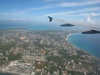 IMG 0700  The Turtle Farm is at the bottom of the photo and the northern end of Seven Mile Beach is under the wing