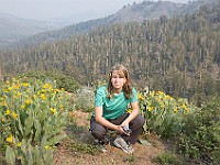 DSC 2396  Teagan at Sonora Pass; smoke/haze from the wildfires in the background : flowers