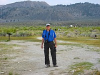 IMG 4674  Richard on the south shore look with volcanoes in the background : flowers