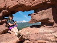 DSC 2282  Siamese Twins window in Garden of the Gods with random hiker and Pikes Peak